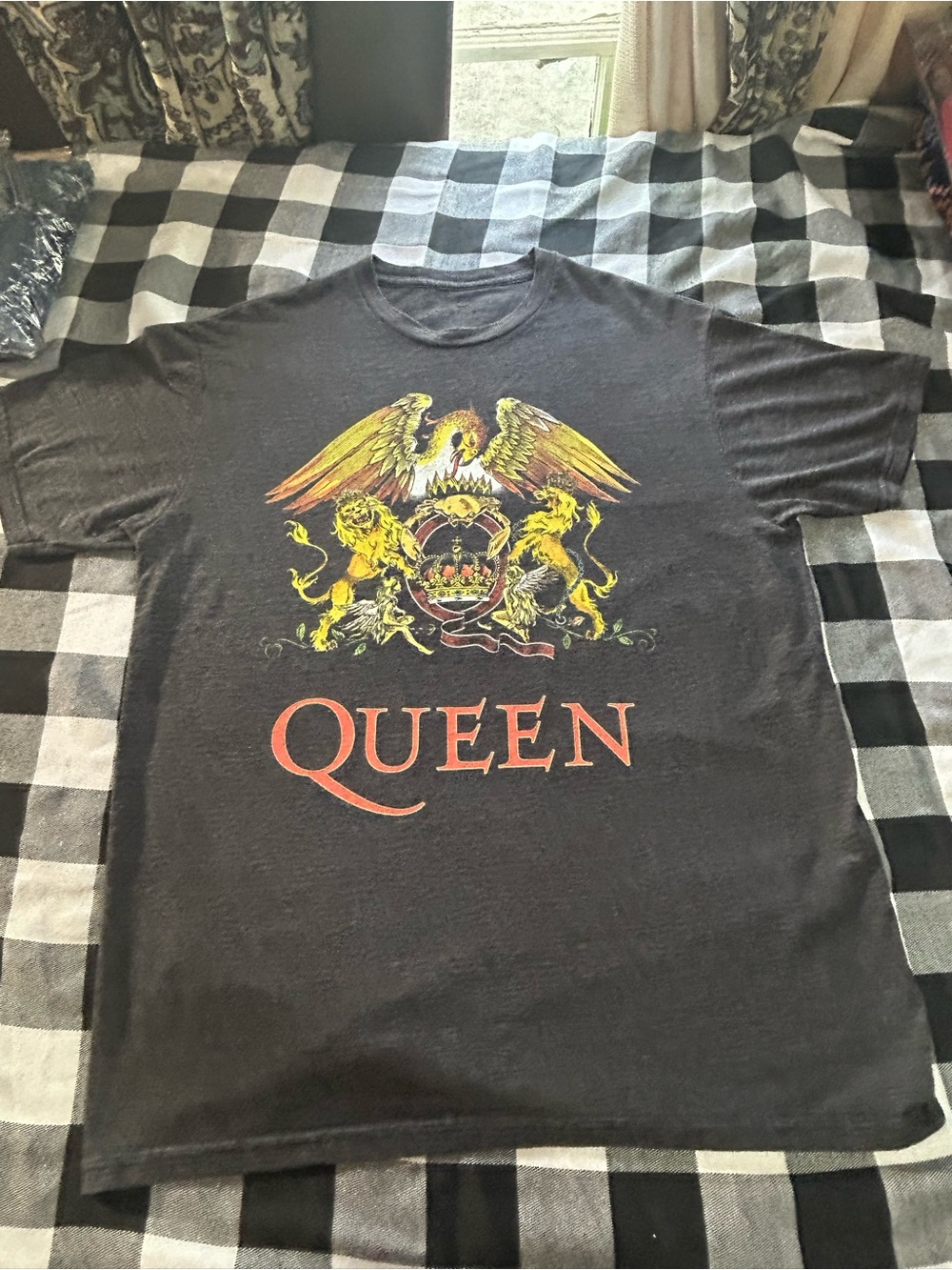 Que Black Short Sleeve Band Tee with Yellow & Orange Crest